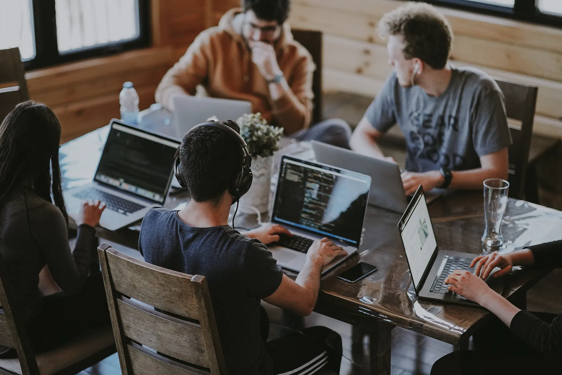 team of software engineers working at a table together