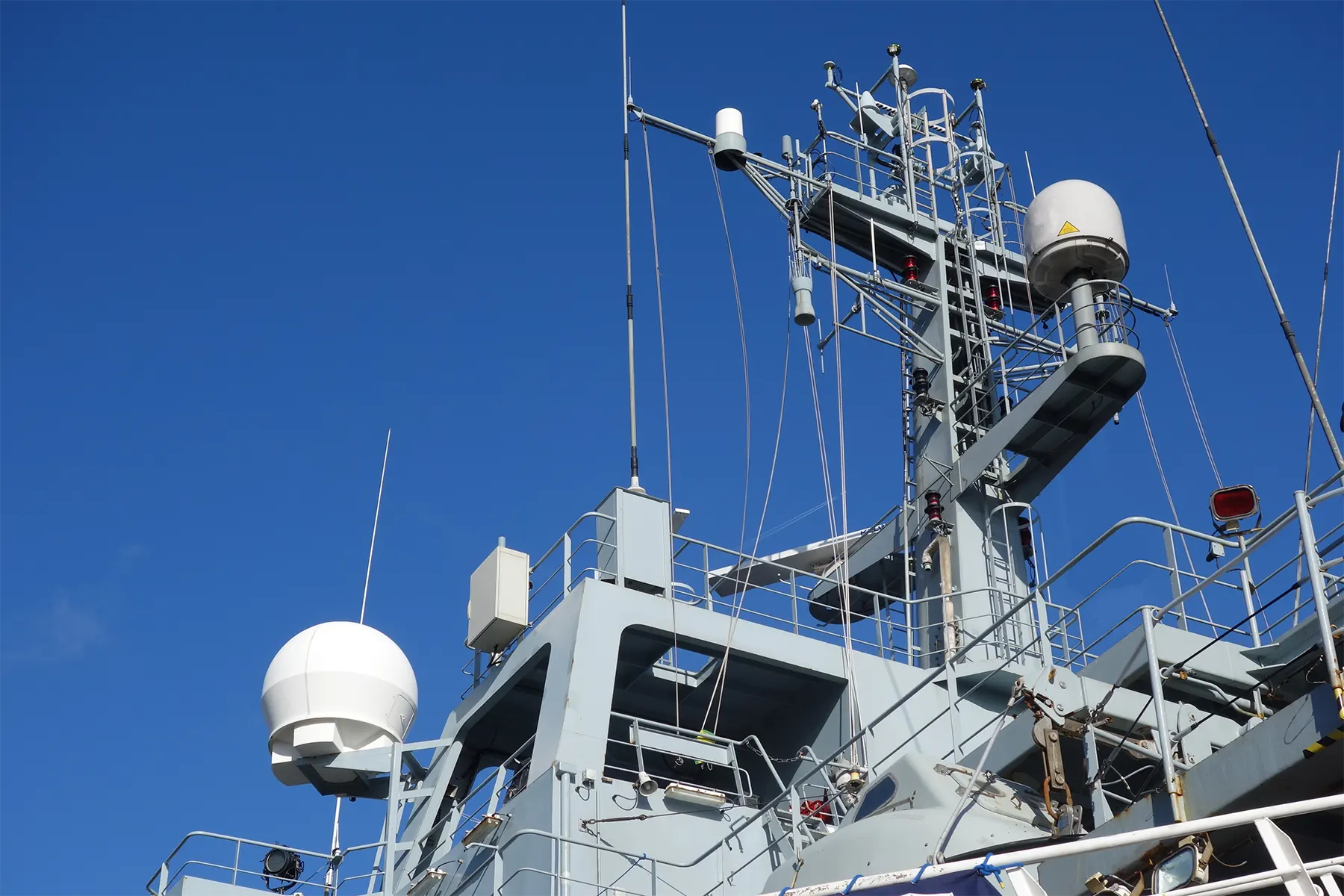 Etenna on top of a naval ship